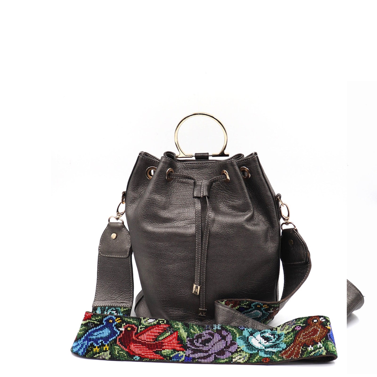 bk-1336 bolsa/morral de piel con asa de chaquira artesanal de fauna